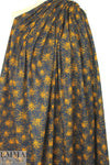 Italian cinnamon/navy daisy print cotton woven