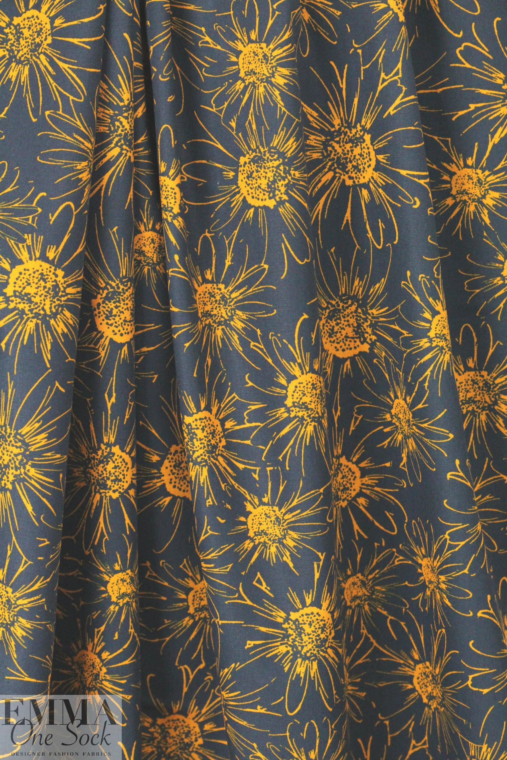 Italian cinnamon/navy daisy print cotton woven 1.75 yds