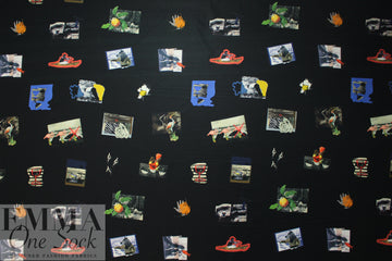 Pau1 Smith quirky stamps on black cotton shirting .8 yds