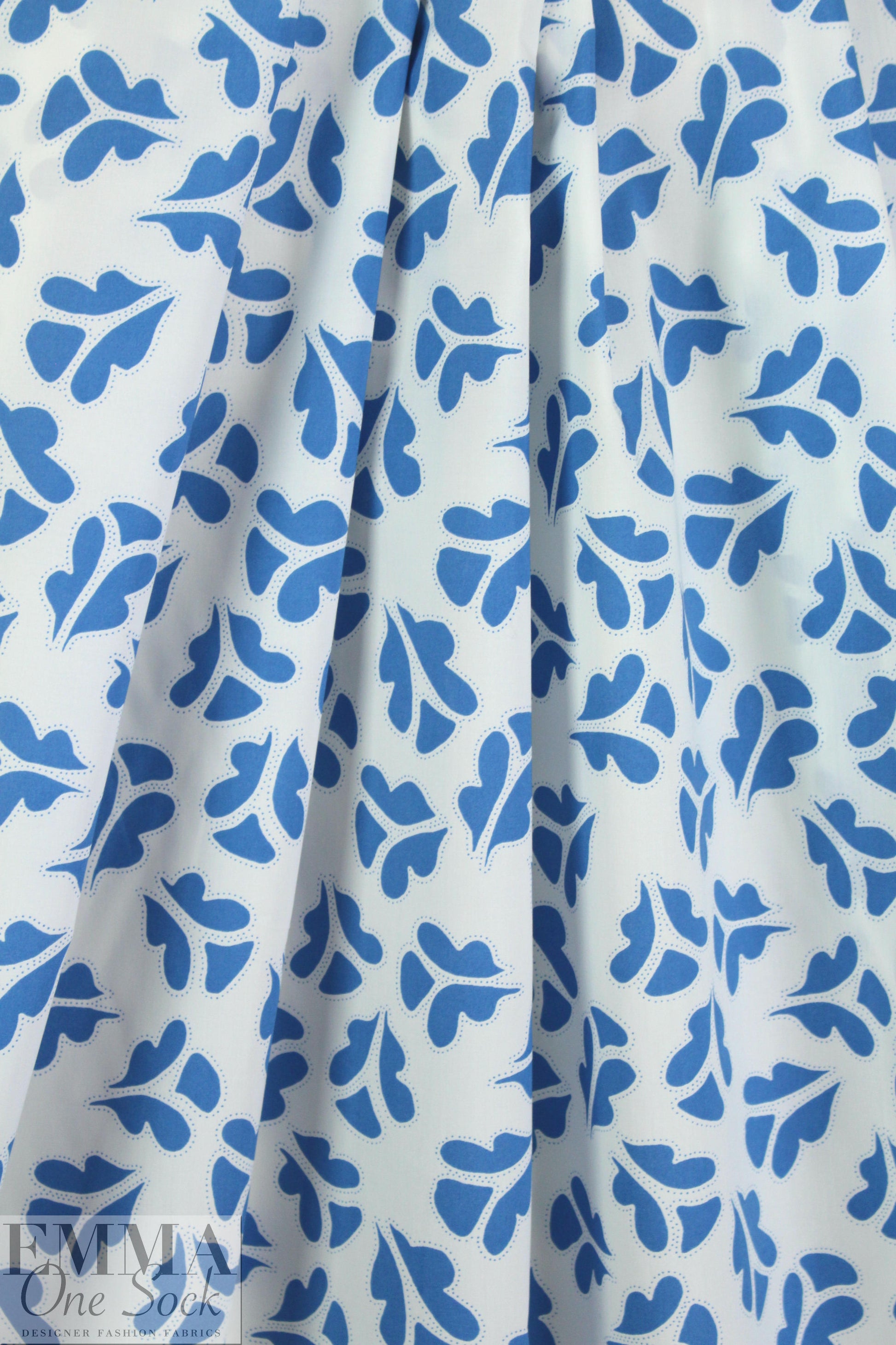 NY designer blue leaf stamp on white cotton shirting