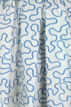 NY designer blue serpentine on white cotton shirting 1.5 yds