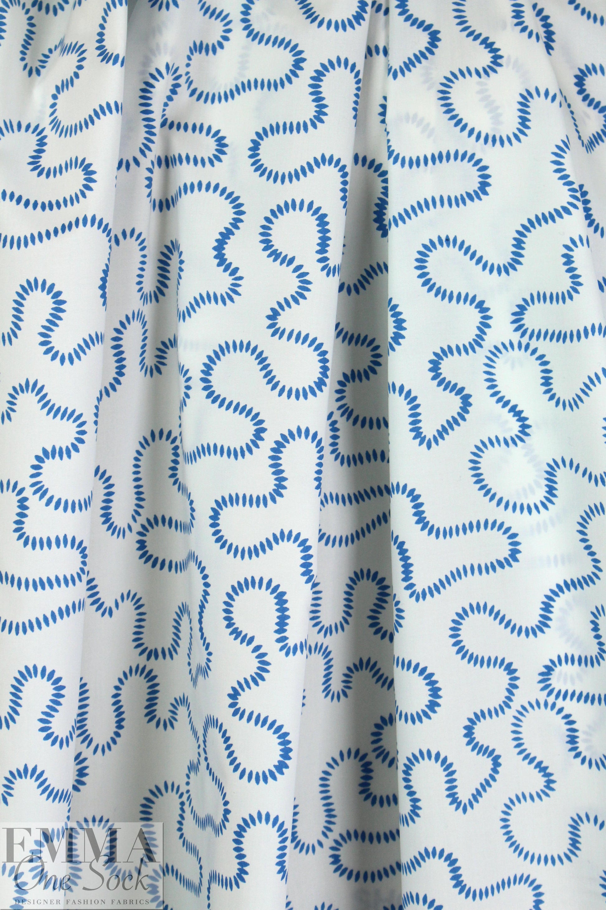 NY designer blue serpentine on white cotton shirting 1 yard