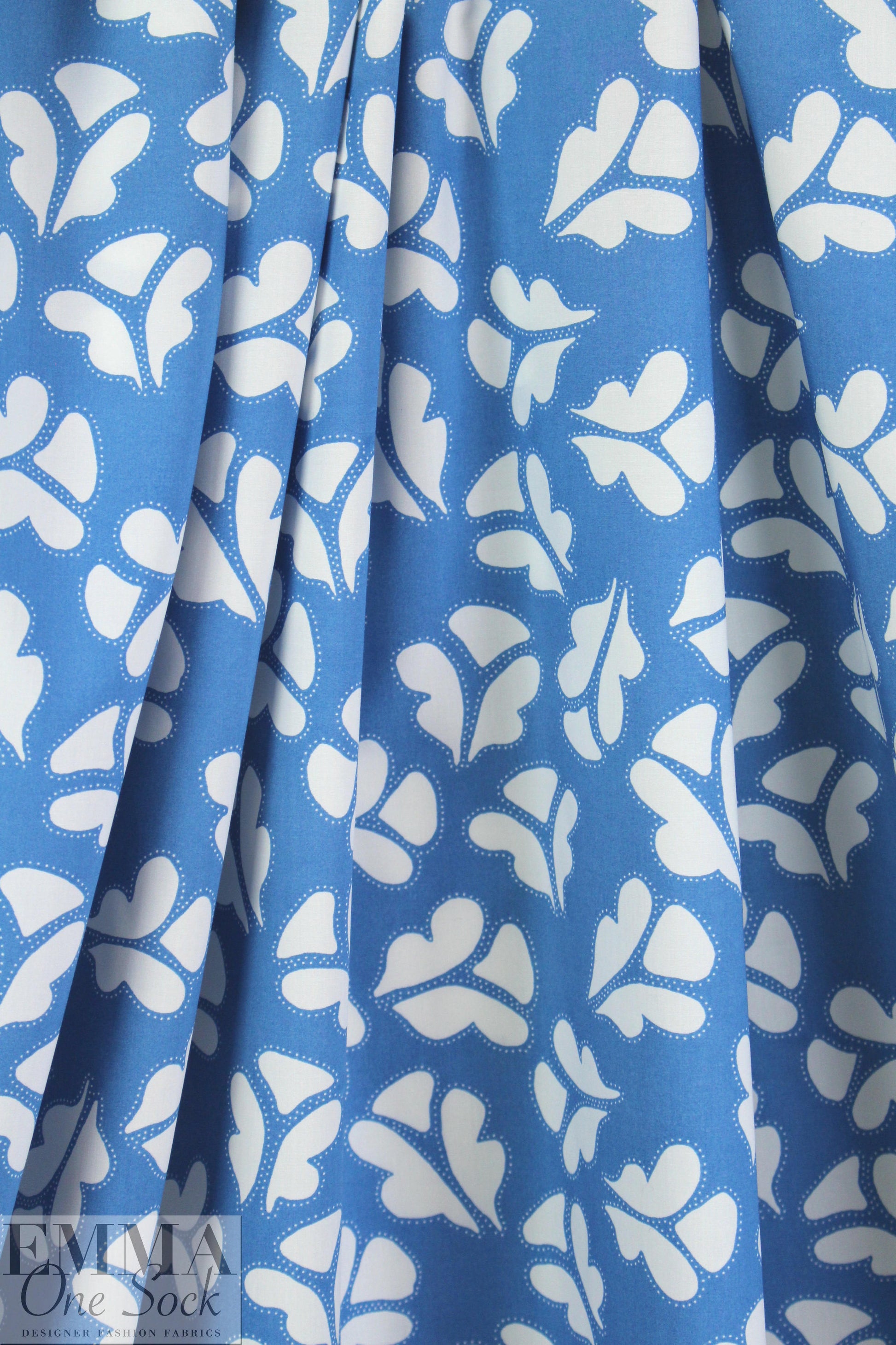 NY designer white leaf stamp on blue cotton shirting 1.5 yds