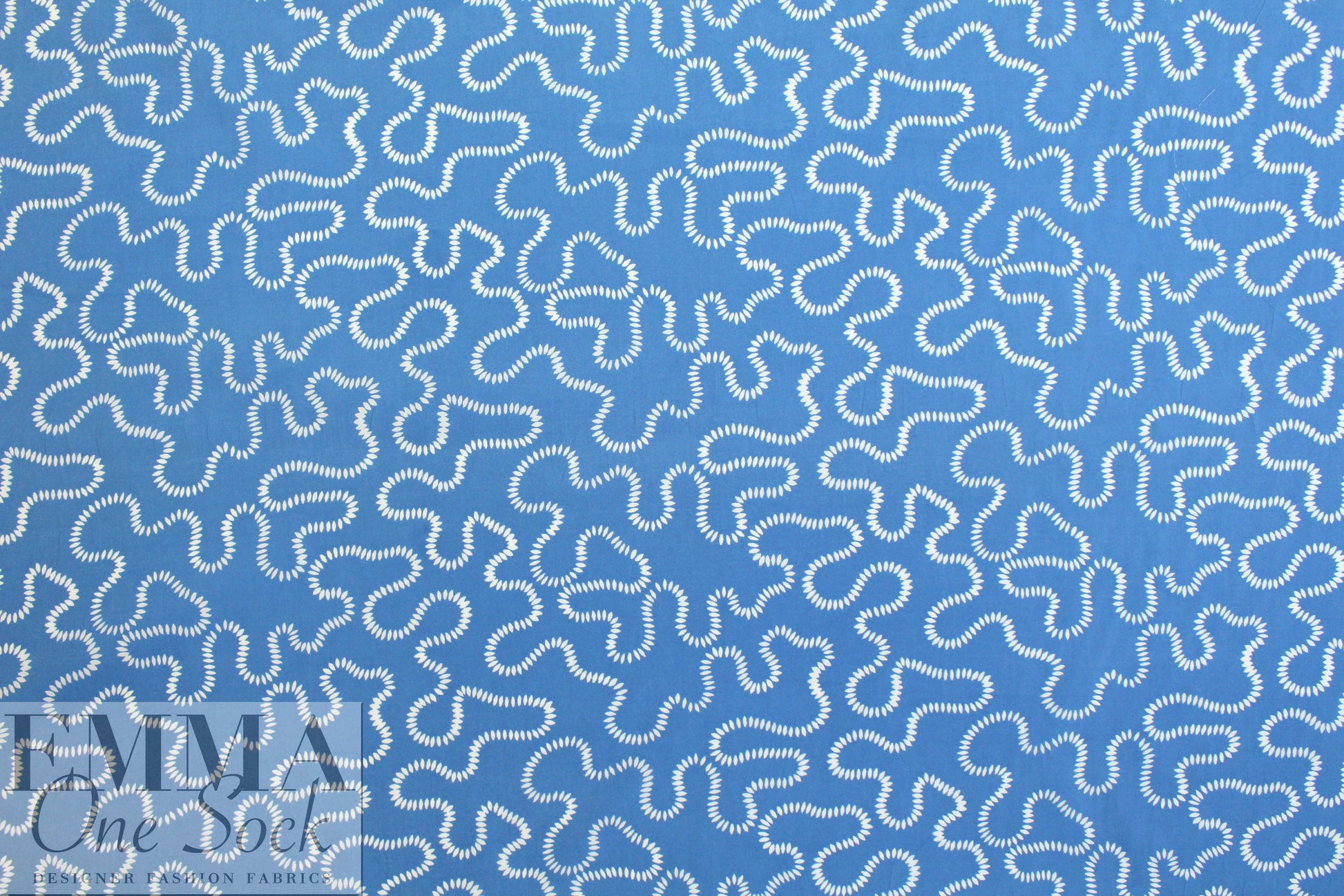 NY designer white serpentine on blue cotton shirting 1.2 yds