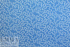 NY designer white serpentine on blue cotton shirting 2 yds