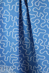 NY designer white serpentine on blue cotton shirting 1.5 yds