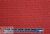 famous designer navy diamonds on red cotton woven