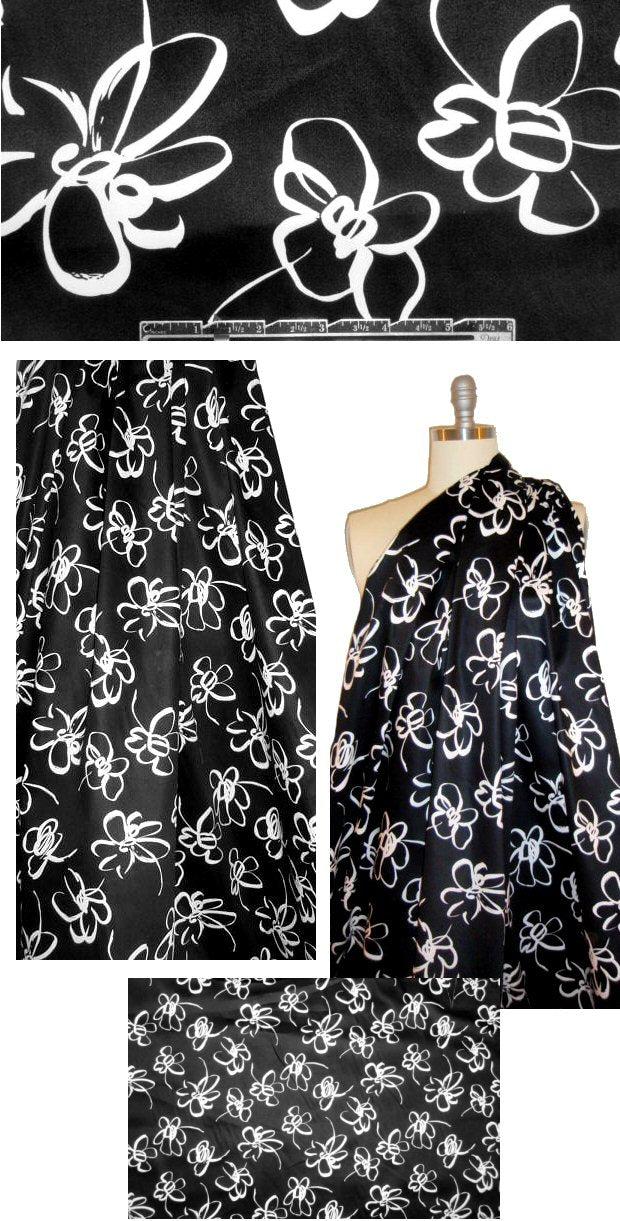 white on black stylized flowers cotton/lycra sateen