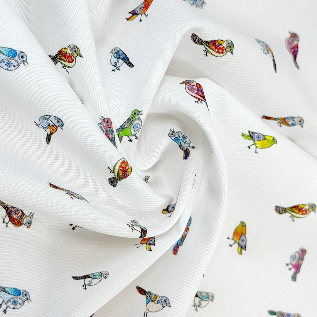 Italian 'bird trinkets' cotton poplin .66 yds