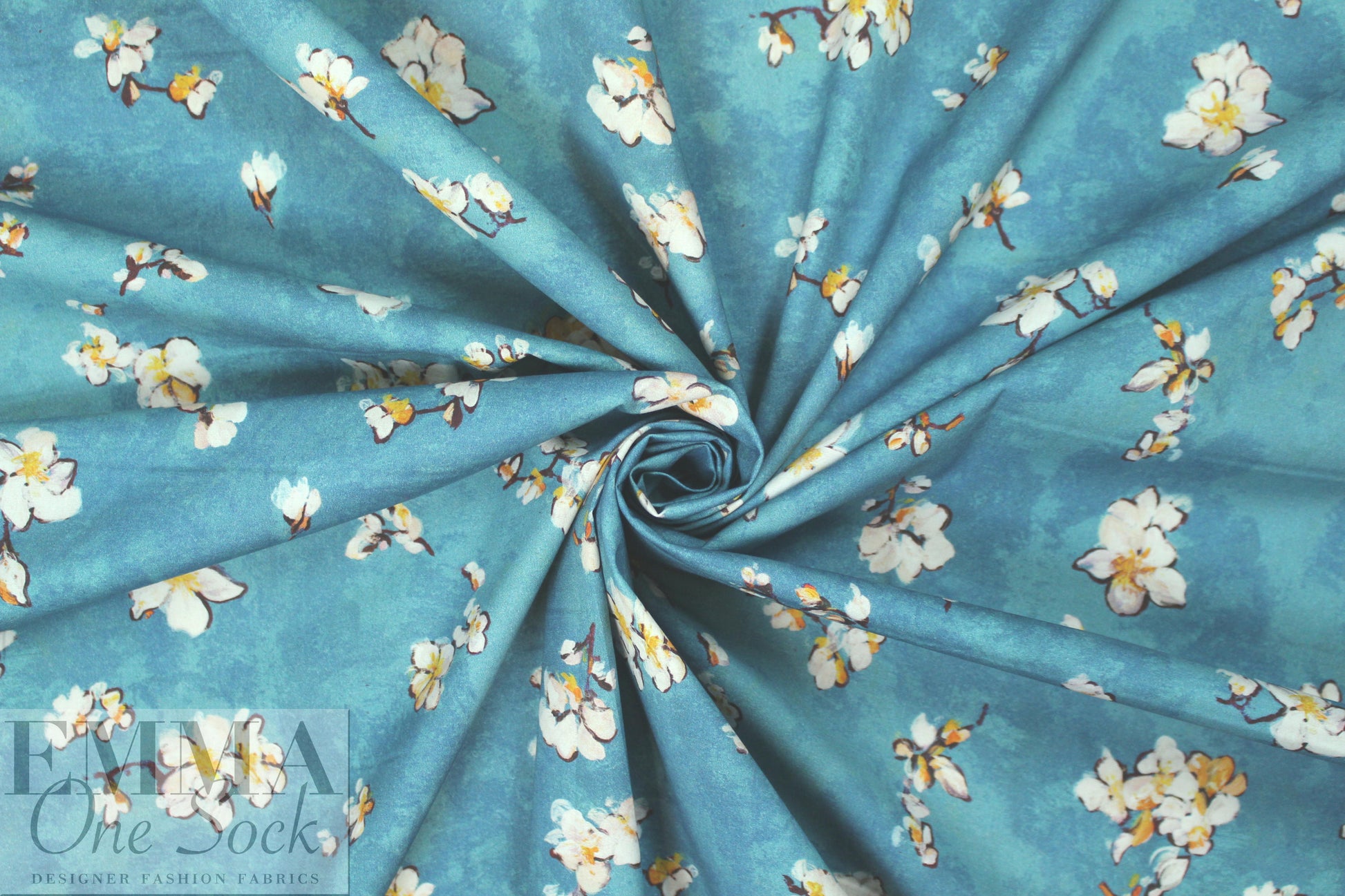 Caroline C0nstas blossoms on teal cotton stretch shirting