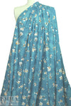 Caroline C0nstas blossoms on teal cotton stretch shirting