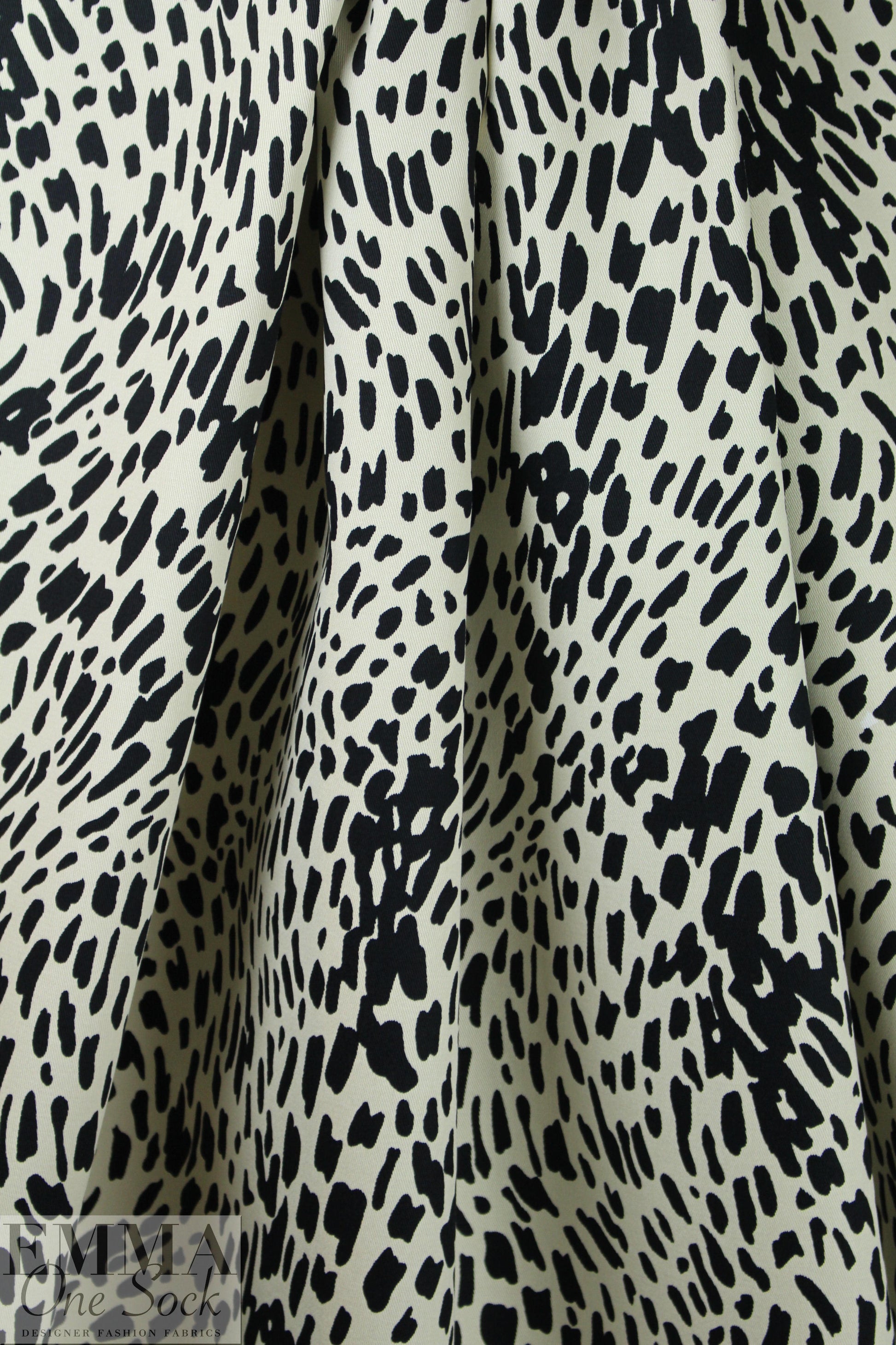 Italian stylized animal print cotton twill