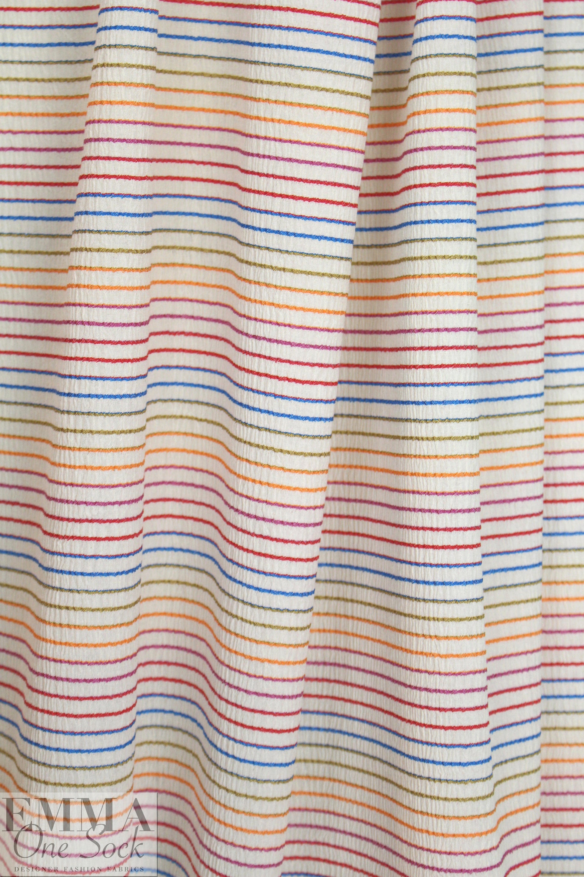 NY designer ivory crinkle stretch woven with colorful stripes