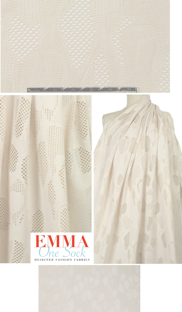 Italian lacey cut-out novelty knit - ivory 1.625 yd