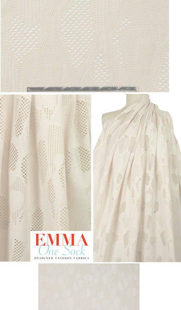 Italian lacey cut-out novelty knit - ivory 1.625 yd