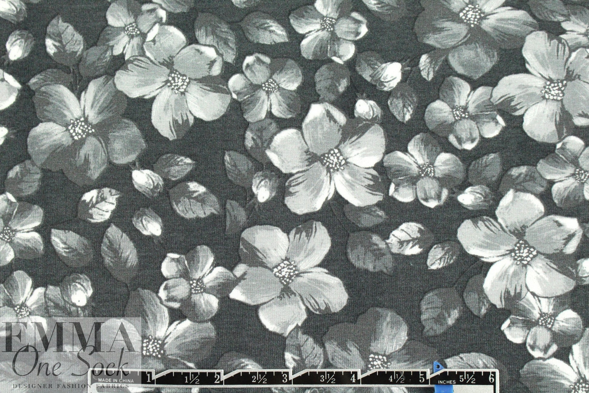 Italian digital viscose knit - newsprint blossoms