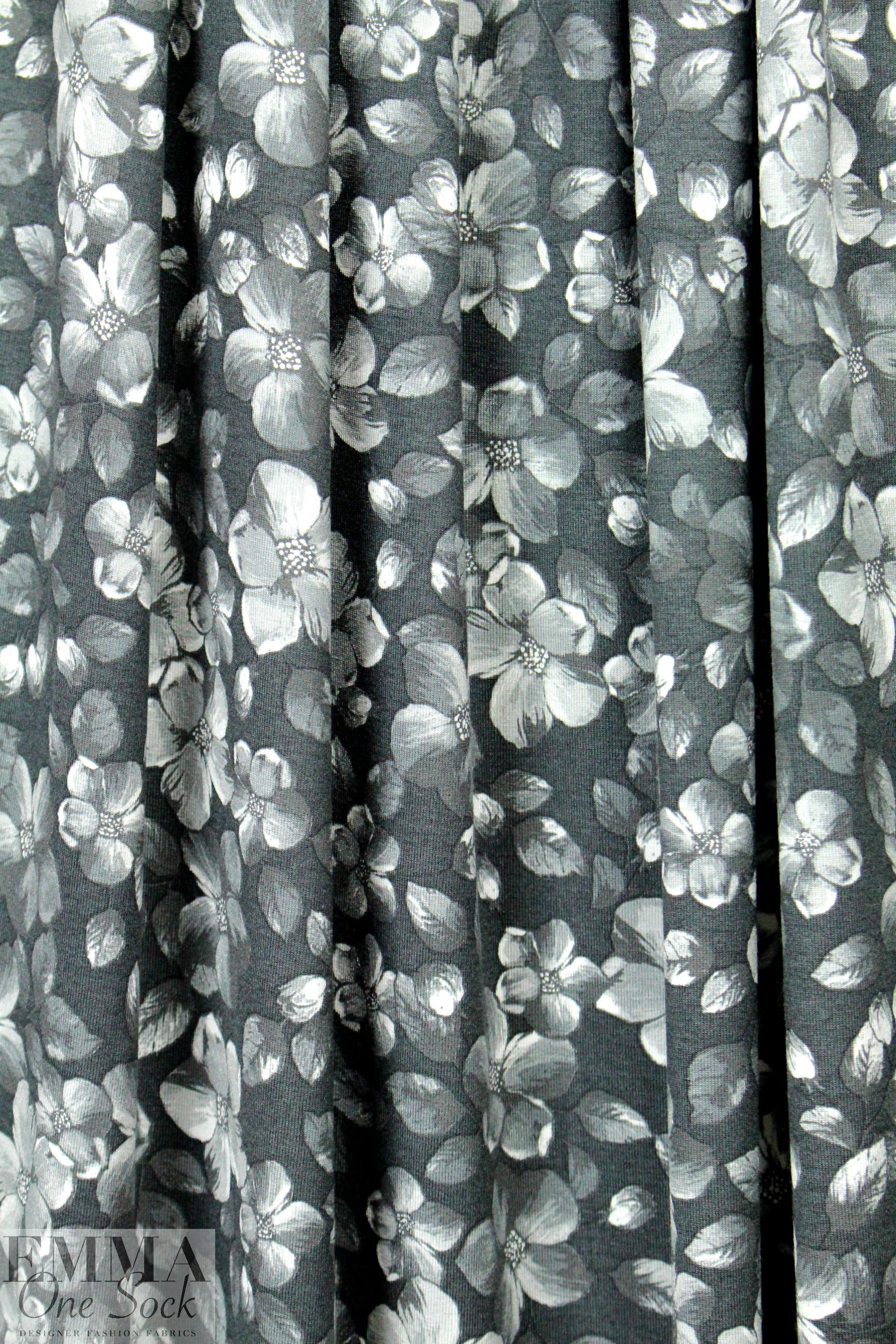 Italian digital viscose knit - newsprint blossoms 1.66 yds