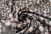 'tiny eclipses' rayon blend sweater knit -brown/black 1.375 yd