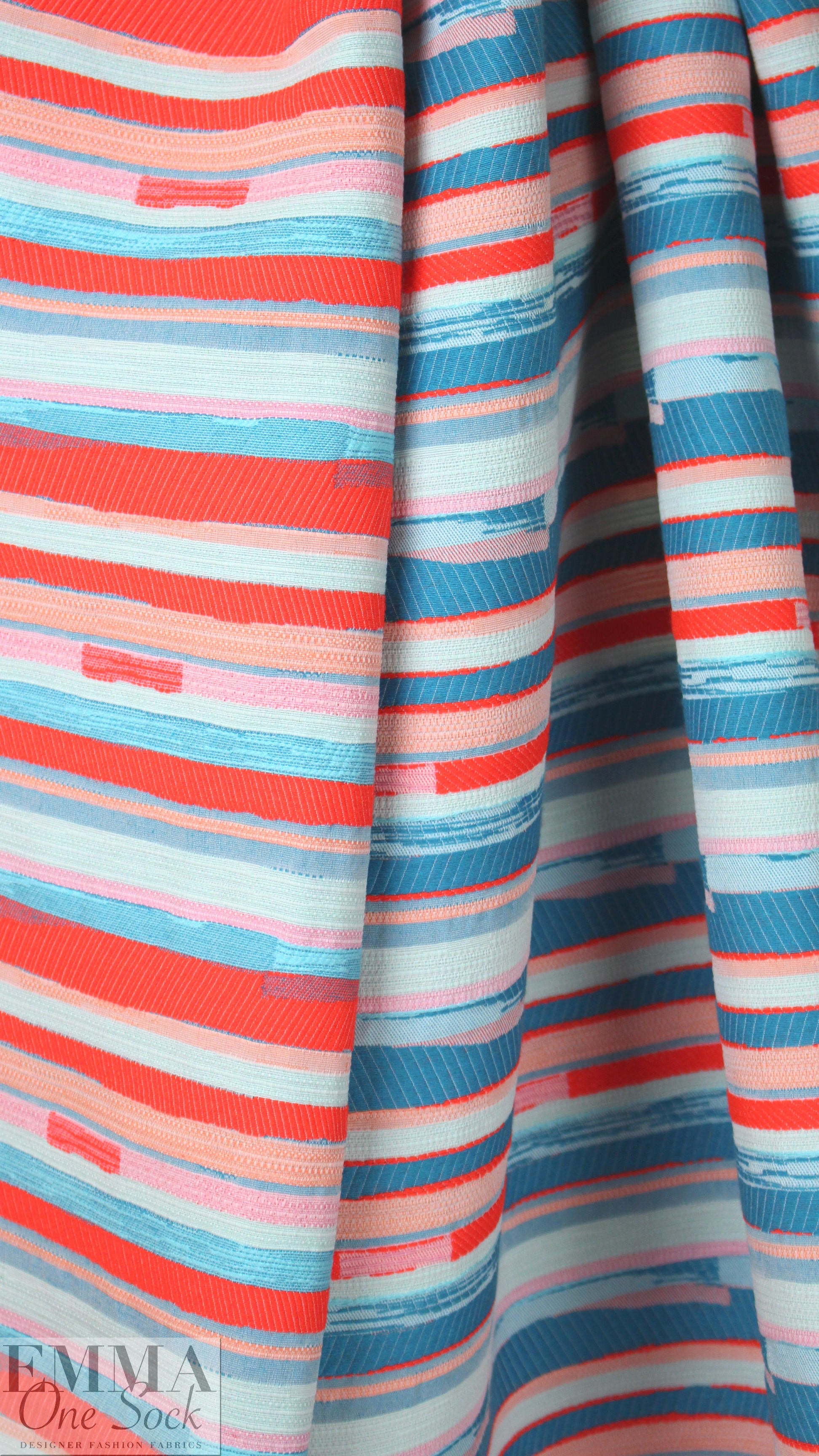 NY designer turquoise/hot orange novelty stripe woven
