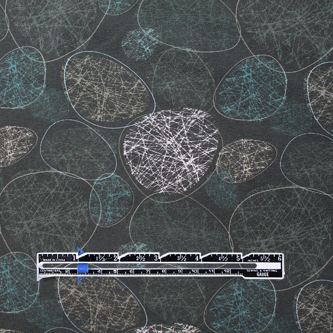 Dutch digital 'etched stones' cotton knit Oeko-Tex cert. - black/teal .875 yds