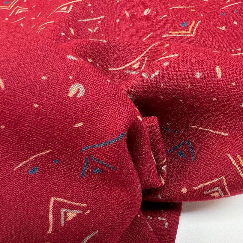 Italian 'aurora signs' wool crepe border print