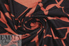 MTM ECOVERO jersey Oeko-Tex cert., 'odd puzzle' - sienna/caviar 1.25 yds