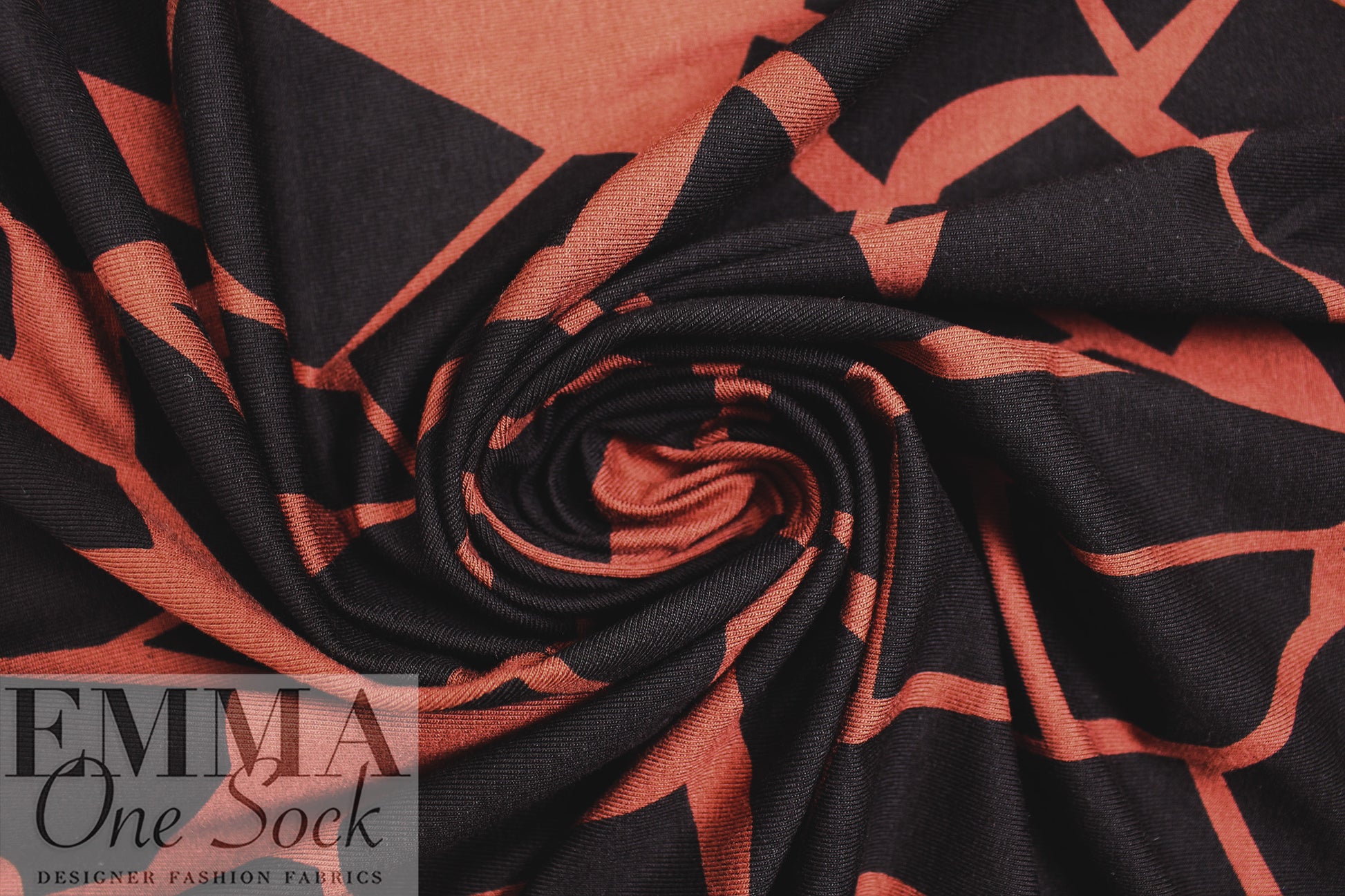 MTM ECOVERO jersey Oeko-Tex cert., 'odd puzzle' - sienna/caviar 1.25 yds