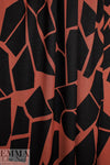 MTM ECOVERO jersey Oeko-Tex cert., 'odd puzzle' - sienna/caviar 1.25 yds