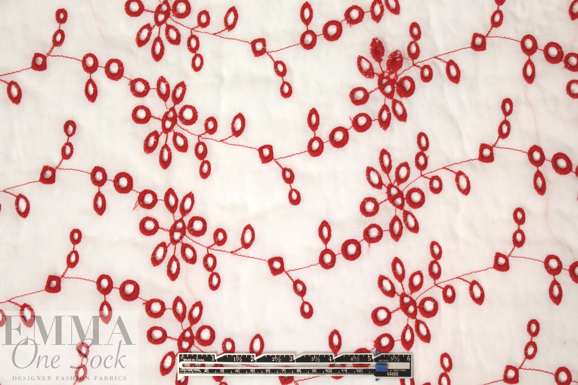 CA designer cotton eyelet - red on white .875 yds