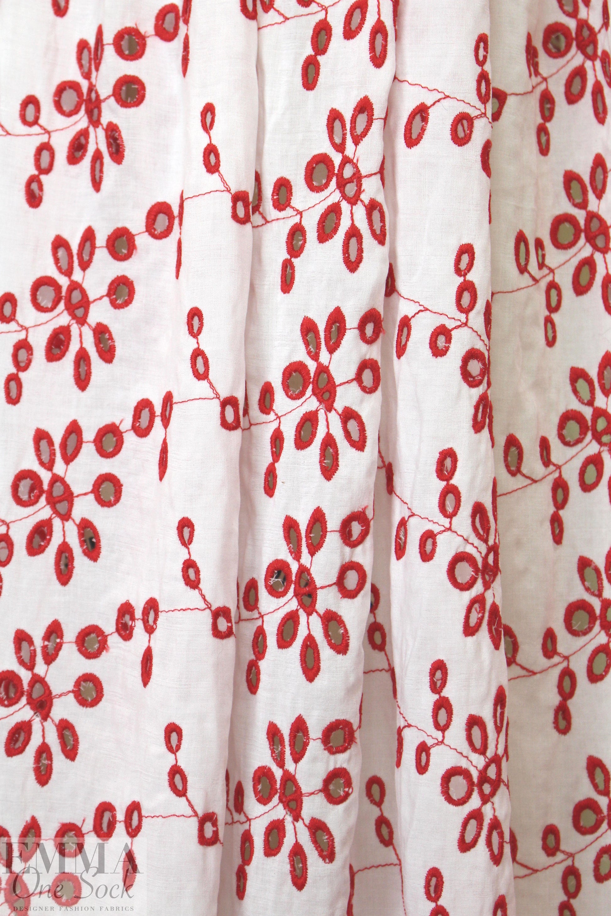 CA designer cotton eyelet - red on white .875 yds