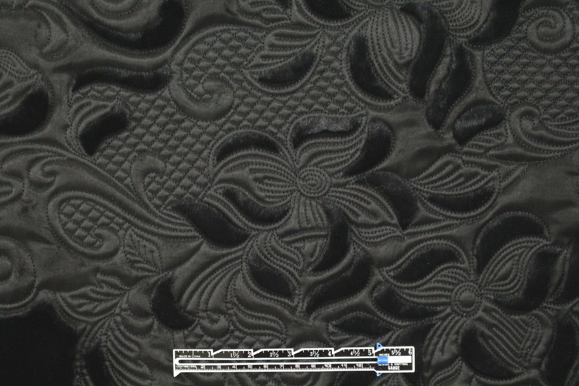 Italian faux fur with leather-look applique' border 2.5 yd