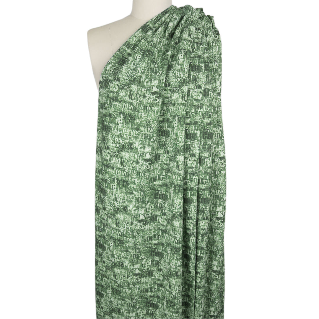 Dutch 'love language' French terry knit Oeko-Tex cert. - green/black 1.75 yd