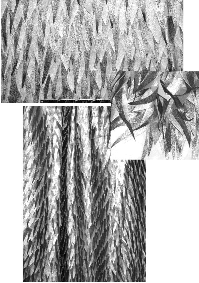 fancy white/silver silk backed faux leather fringe 2 yd