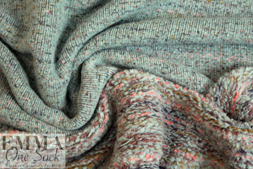 Derek L. novelty faux fur knit - dusty blue/pink .875 yds
