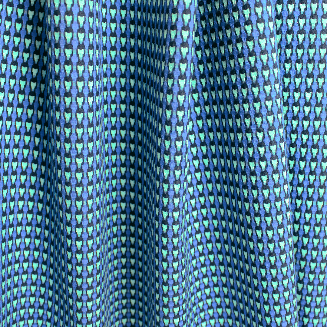 Italian reversible geometric stretch cotton suiting - aqua/cobalt 1.625 yds