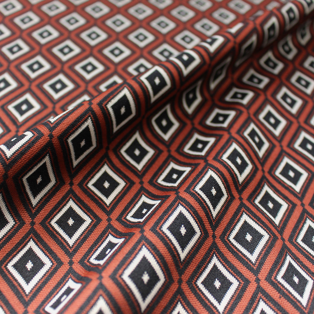 yarn dyed 'diamond run' jacquard knit - black/burnt orange/ecru 1.25 yds