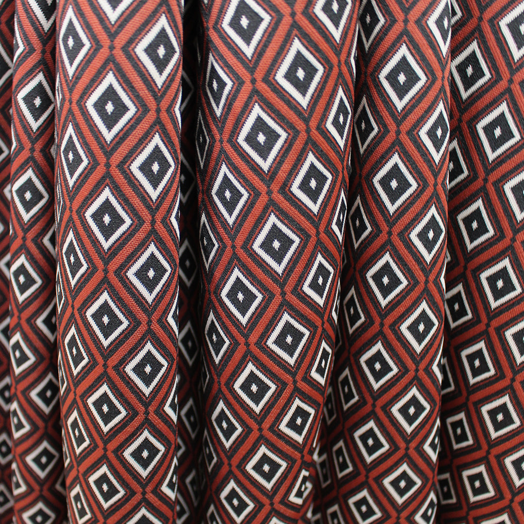 yarn dyed 'diamond run' jacquard knit - black/burnt orange/ecru 1.25 yd