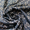 yarn dyed 'diamond run' jacquard knit - black/navy/ecru 1 yard