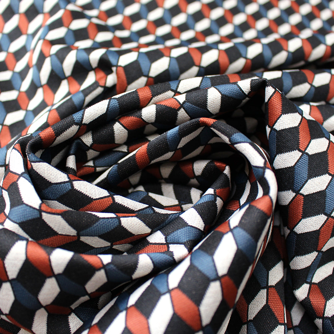 yarn dyed 'diamond link' jacquard knit - black/orange/teal 1.75 yd