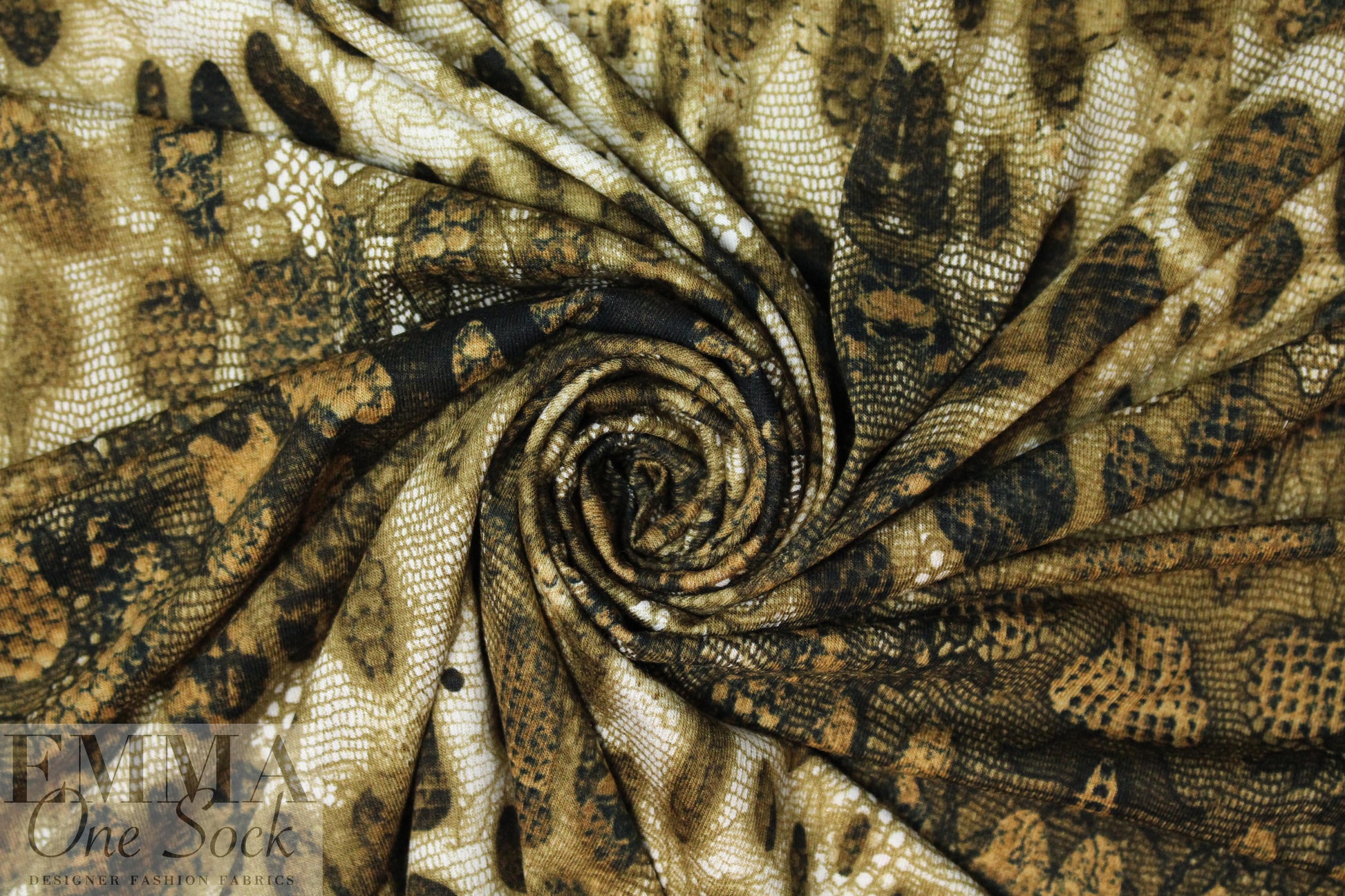 Italian digital viscose knit - bronze tones cellular abstract
