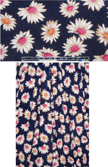 daisy dream rayon/lycra knit - pink/orange/midnight .75 yds