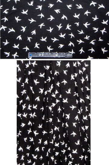 birds aflight rayon/lycra knit - black/white .5 yds