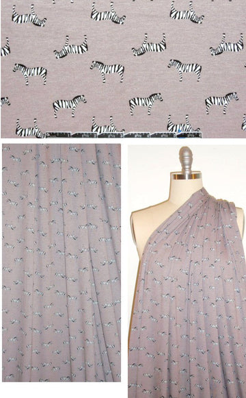 zebras on taupey gray rayon/lycra knit 1.4 yd