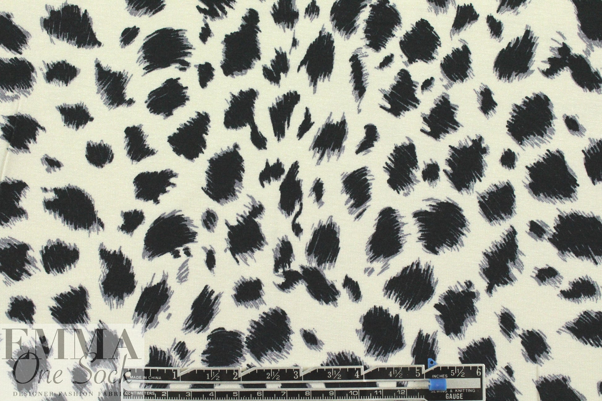 furry spots rayon/span jersey - black on ivory .75 yds