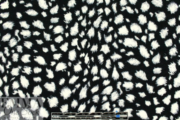 furry spots rayon/span jersey - ivory on black .75 yds