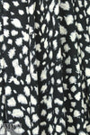 furry spots rayon/span jersey - ivory on black 1.625 yd