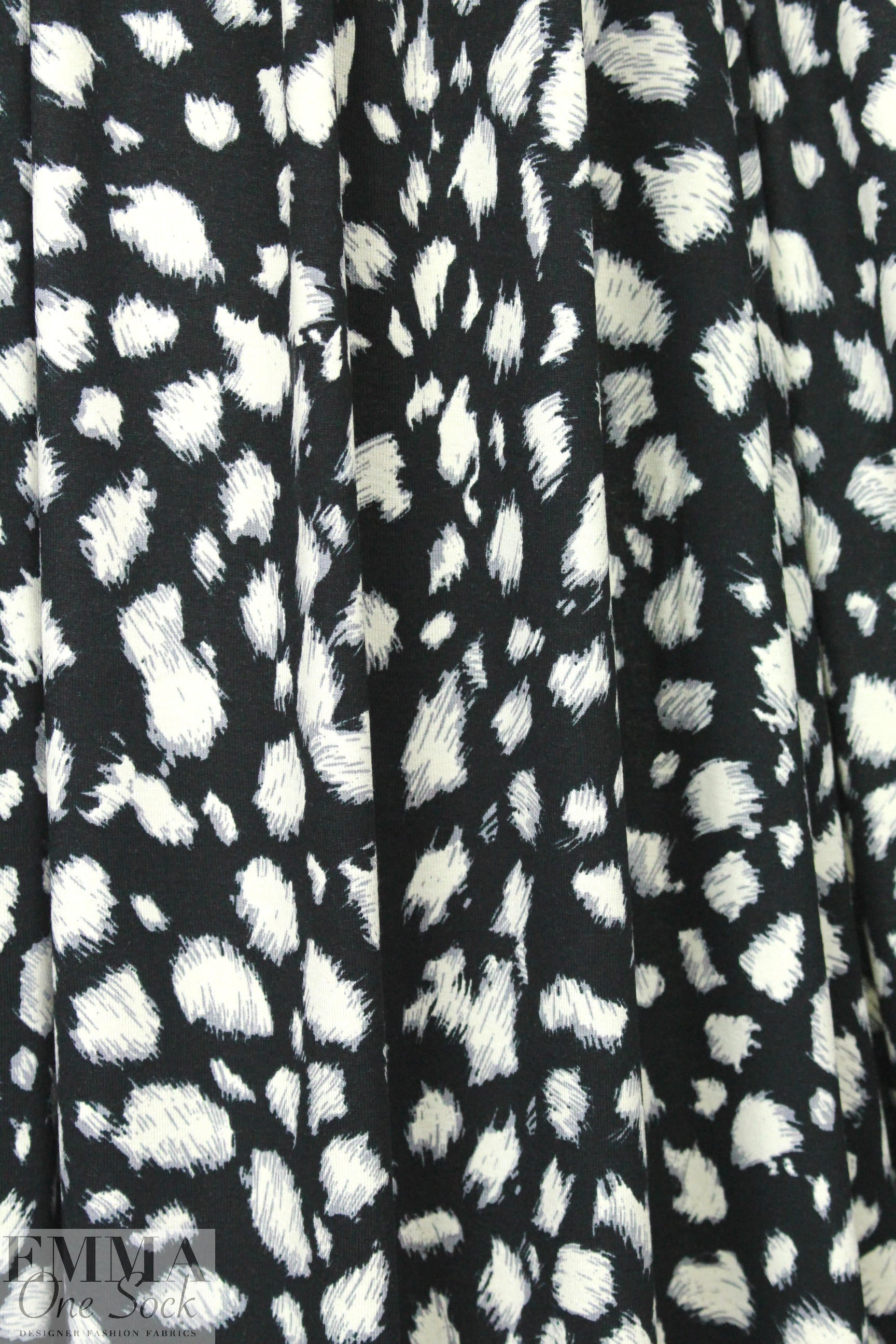 furry spots rayon/span jersey - ivory on black 1.625 yd