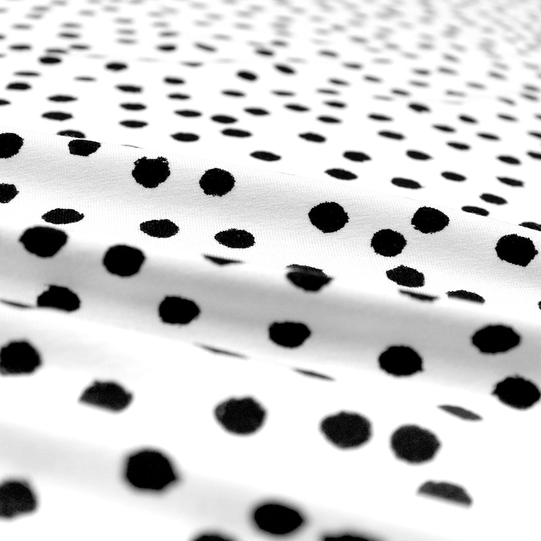 dotted black on white lightweight bamboo knit, Oeko-Tex cert. 1.75 yd