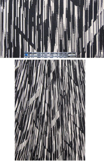 Cadena black/natural woodcut rayon/lycra knit 1.66 yd