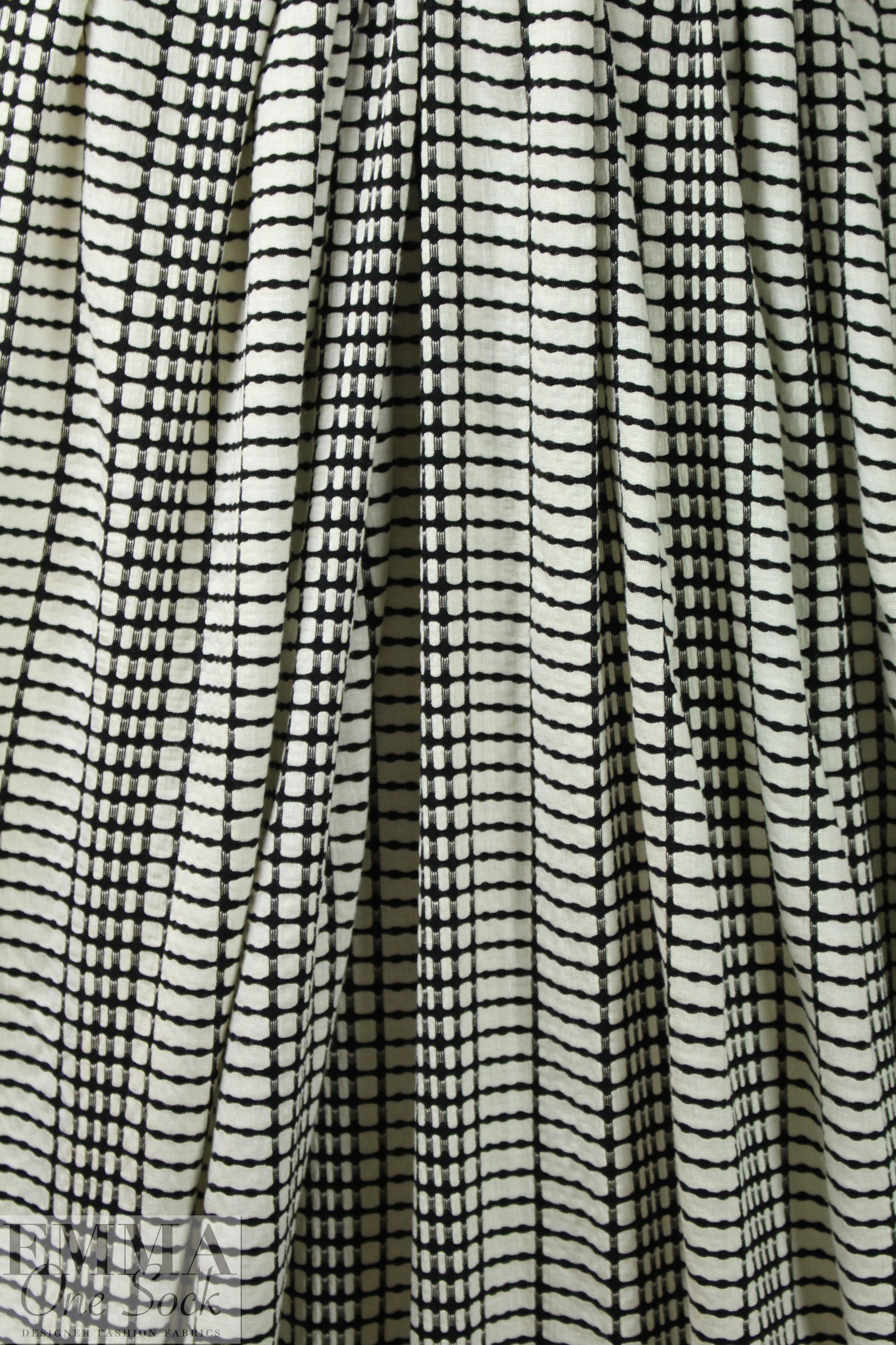 CA designer black/ivory yarn-dye grid novelty knit